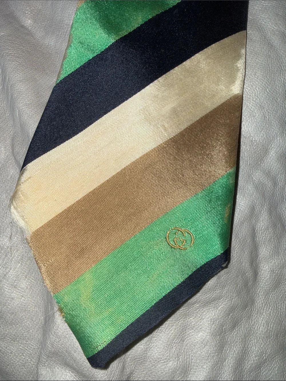 Vintage Gucci tie. Has frayed ends but overall clean and in good condition.